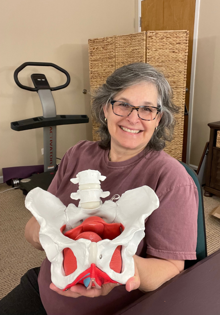 Holly with pelvic model. Holly with pelvic model.